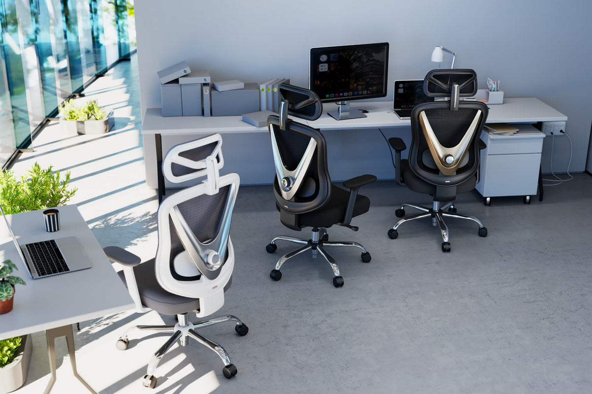 HOLLUDLE V Chair ergonomic office chair collection in white and black colorways displayed in modern glass-wall corporate office